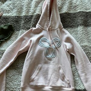 Light pink TNA hoodie sweater